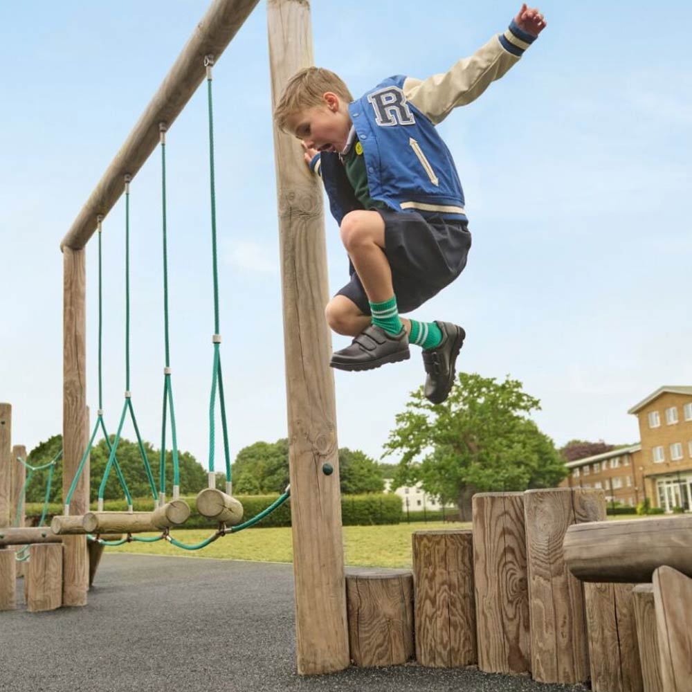 boy jumping in playground